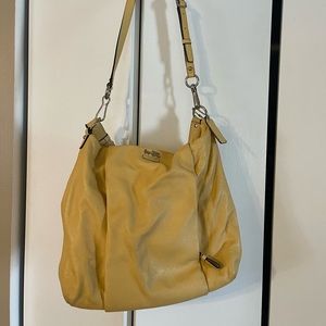 Large Yellow Coach purse. Has additional strap to be converted into crossbody.